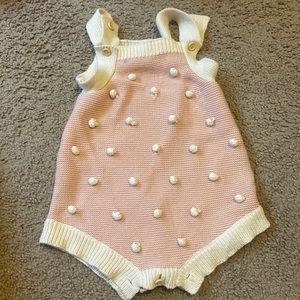 Pink and cream polka dot onesie